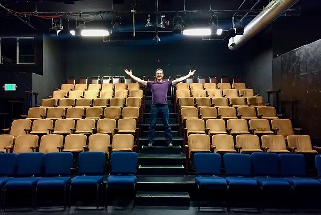 David Rodwin in a theatre